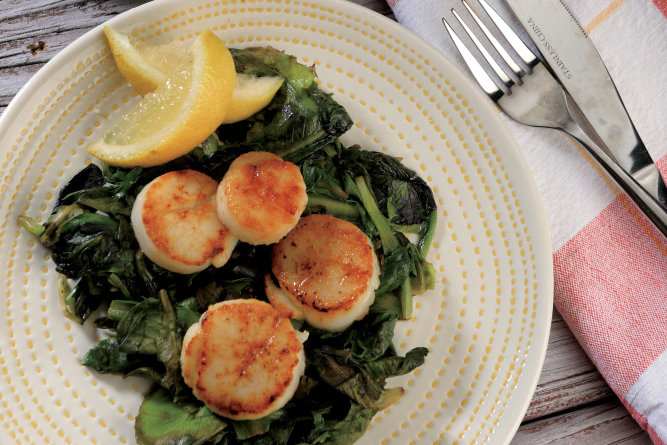 Braised Sea Scallops Over Spring Greens