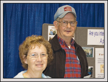 SAMPSON County Farm Bureau board member Buck Blanchard and his wife, Women’s Committee member Shelby, visit NCFB’s display at the Murphy-Brown Vendor Expo March 17 at<br /> the Duplin Events Center in Kenansville. 